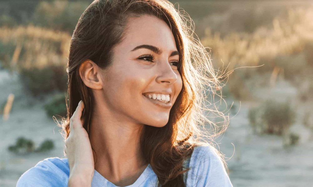 Portrait of a Beautiful smiling lady | Skincare from sun damage | Instinct Holistic Medical Spa in Bozeman, MT